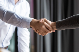 two people shaking hands